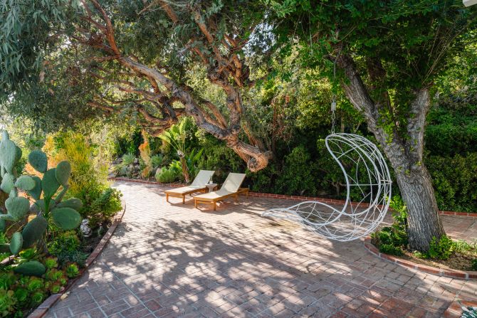 The private garden is filled with eucalyptus, yucca and blue agave on over three coastal acres.