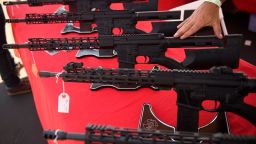 A TPM Arms LLC California-legal featureless AR-15 style rifle is displayed for sale at the company's booth at the Crossroads of the West Gun Show at the Orange County Fairgrounds on June 5, 2021 in Costa Mesa, California. - Gun sales increased in the US following Covid-19 pandemic lockdowns. On June 4, a San Diego federal court judge overturned California's three-decade old ban on assault weapons, defined as a semiautomatic rifle or pistol with a detachable magazine and certain features, but granted a 30-day stay for a State appeal and likely future court decisions on the constitutionality of the ban under the Second Amendment. An industry of California legal "featureless" or "compliant" AR-15 style rifles developed for California consumers, adapting to the law with design changes to the popular rifle. (Photo by Patrick T. FALLON / AFP) (Photo by PATRICK T. FALLON/AFP via Getty Images)