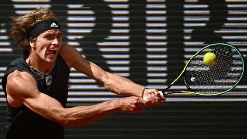 Zverev plays a backhand against Baez in their second-round match.