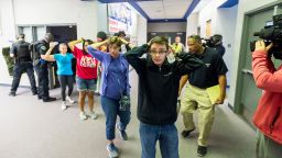 Students are led out of school as members of the Fountain Police Department take part in an Active Shooter Response Training exercise at Fountain Middle School in Fountain, Colorado on June 9 ,2017. The nation's two largest teachers unions want schools to revise or eliminate active shooter drills, asserting Tuesday, Feb. 11, 2020 that they can harm students' mental health and that there are better ways to prepare for the possibility of a school shooting. (Dougal Brownlie/The Gazette via AP, File)