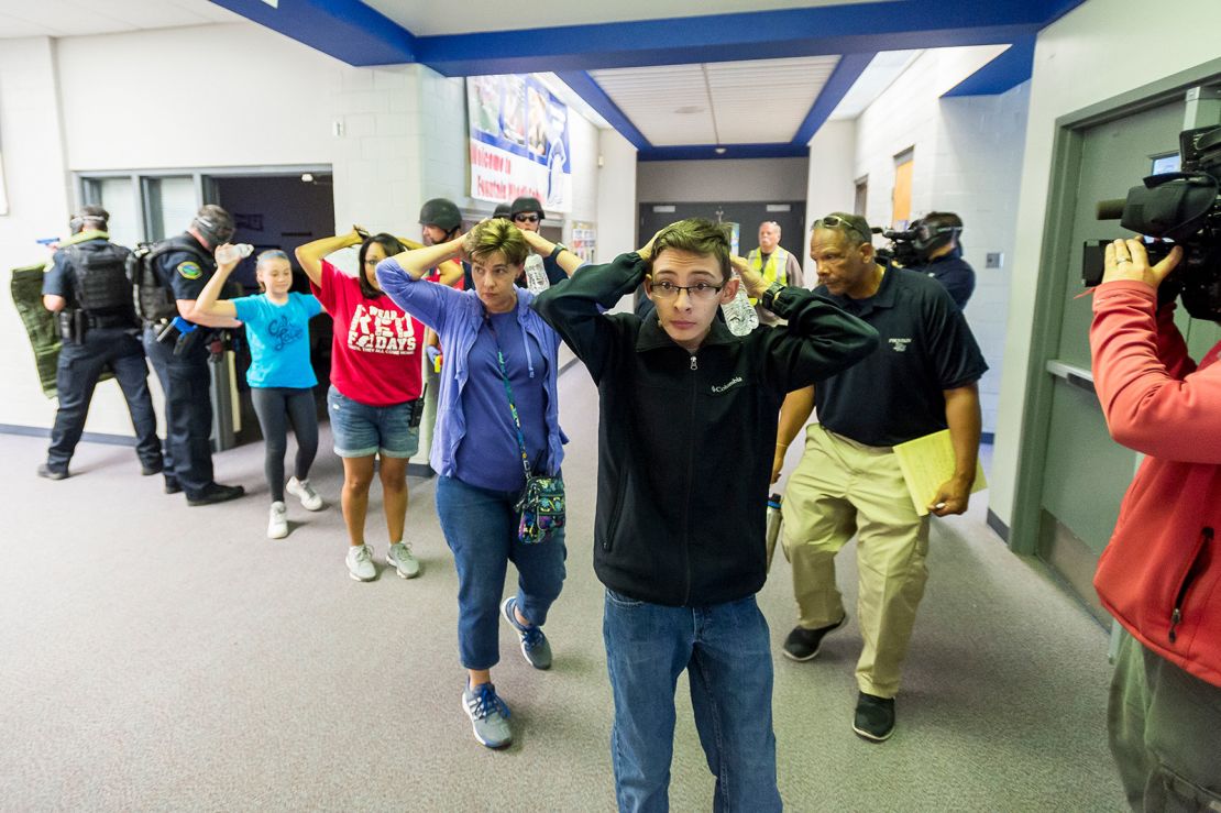 Students take part in an active shooter response training exercise at a Fountain, Colorado, middle school in 2017. 