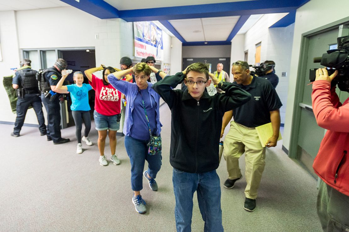Students take part in an active shooter response training exercise at a Fountain, Colorado, middle school in 2017.