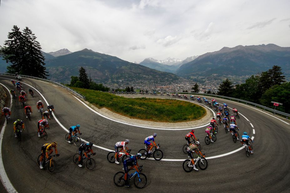 Cyclists race down a road toward the Italian city of Aosta during the 15th stage of the Giro d'Italia on Sunday, May 22.
