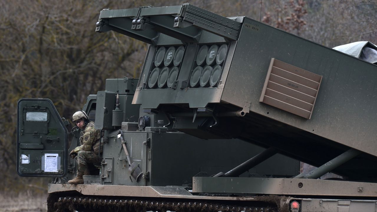 In this File photo from 2020, a US soldier sits at a Multiple Launch Rocket System (MLRS) after an artillery live fire event by the US Army Europe's 41st Field Artillery Brigade in Germany.
