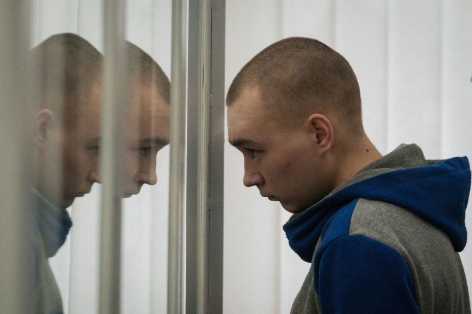 Russian soldier Vadim Shishimarin listens to a translator's words as he is tried at a Ukrainian court in Kyiv on Saturday, May 20. <a href="https://edition.cnn.com/europe/live-news/russia-ukraine-war-news-05-23-22/h_4c6a5adf7848593f8d4d661e38a07f50" target="_blank">He was later sentenced to life in prison</a> after being convicted of killing an unarmed civilian. He is the first Russian soldier to be sentenced for war crimes since Russia invaded Ukraine on February 24.
