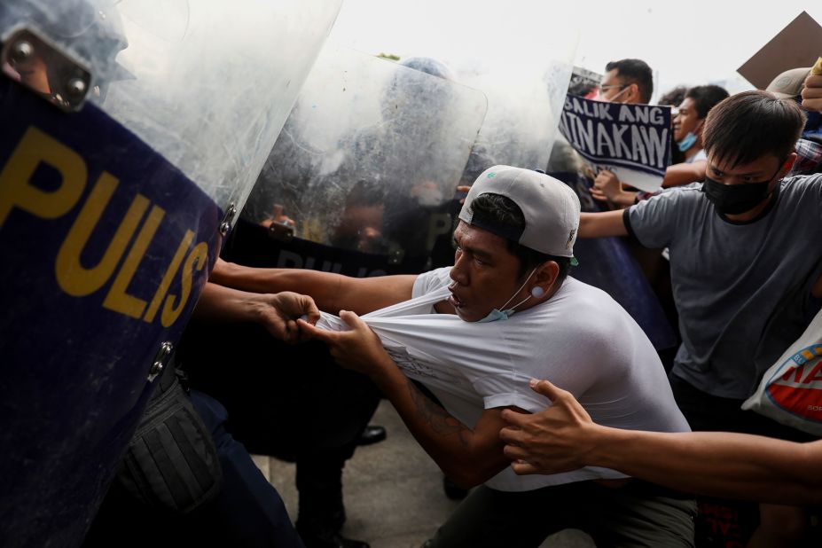 Police in Quezon City, Philippines, disperse activists protesting against the upcoming proclamation of presidential frontrunner Ferdinand Marcos Jr. on Wednesday, May 25. <a href="https://www.cnn.com/2022/05/26/asia/philippines-bongbong-marcos-declared-president-intl-hnk/index.html" target="_blank">Marcos was confirmed as the country's next president</a> later that day. The proclamation formalizes the once unimaginable return to power of the country's most famous political dynasty. A 1986 "people power" revolt drove the Marcos family into exile in Hawaii.