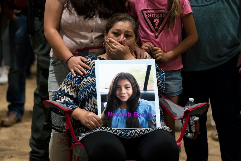 Esmeralda Bravo sheds tears while holding a photo of her granddaughter, Nevaeh, during a prayer vigil in Uvalde, Texas, on Wednesday, May 25. Nevaeh Alyssa Bravo was one of <a href="https://www.cnn.com/2022/05/25/us/victims-uvalde-texas-school-shooting/index.html" target="_blank">the 19 students</a> killed in the school shooting Tuesday at Robb Elementary School. She was 10 years old.