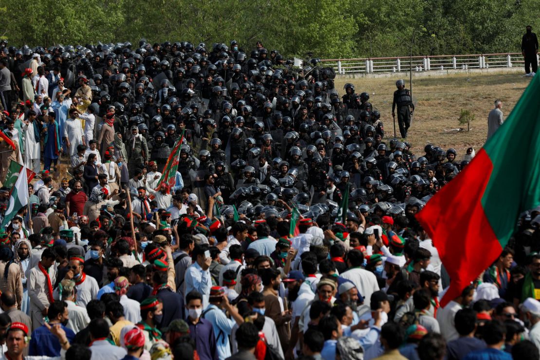 Police attempt to quell protests by supporters of the Pakistan Tehreek-e-Insaf (PTI) political party during a demonstration called by former Prime Minister Imran Khan, in Islamabad on May 26, 2022. 