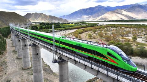 A Fuxing bullet train drives on the Lhasa-Nyingchi railway in Nyingchi, southwest China's Tibet Autonomous Region, June 16, 2021.  Nyingchi is located in the lower reaches of the Yarlung Zangbo River. With an average elevation of 3,100 meters, Nyingchi has one of the most well-protected virgin forests in China, with a forest coverage rate of 53.6 percent.  In the past five years, Nyingchi has received 32 million tourists and made a tourism revenue of over 24 billion yuan about 3.69 billion U.S. dollars. (Photo by Chogo/Xinhua via Getty Images)