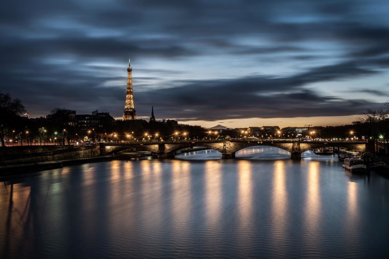 The Eiffel Tower basks in a romantic Paris twilight. France is still at the CDC's Level 3.