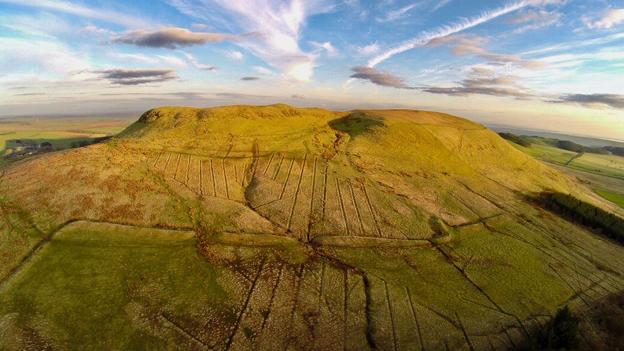 This is Burnswark Hill fort in southwest Scotland, where Roman legions tried to push their boundary northward.