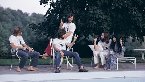 Left to right: drummer Alan White, Eric Clapton (seated), bassist Klaus Voorman, John Lennon and Yoko Ono in Toronto in 1969