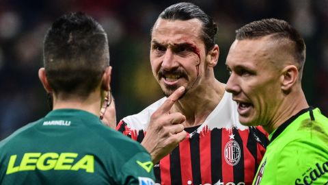 Ibrahimović reacts after being injured following a collision during a Serie A football match between AC Milan and Bologna on April 4, 2022 at the San Siro stadium.