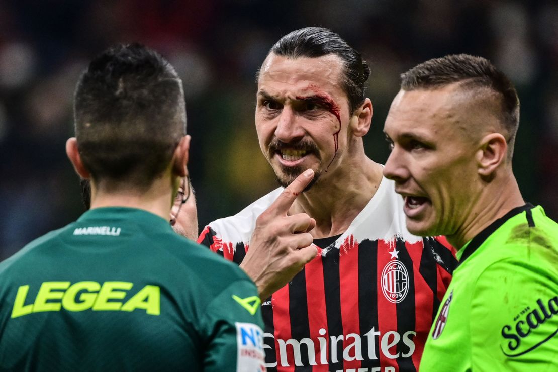 Ibrahimović reacts after being injured following a collision during a Serie A football match between AC Milan and Bologna on April 4, 2022 at the San Siro stadium.