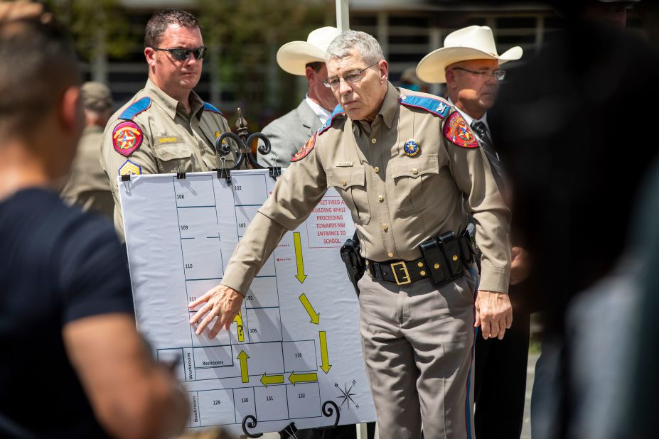 Steven McCraw, the director of the Texas Department of Public Safety, points to a map of <a href="https://www.cnn.com/2022/05/27/us/uvalde-texas-elementary-school-shooting-friday/index.html" target="_blank">the shooter's movements</a> during a news conference on May 27. In all, 80 minutes passed between when officers were first called to the school at 11:30 a.m. to when a tactical team entered locked classrooms and killed the gunman at 12:50 p.m., McCraw said.