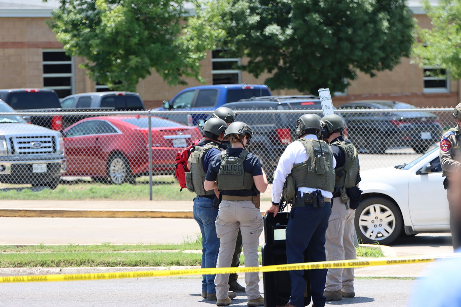 Law enforcement works near the scene.