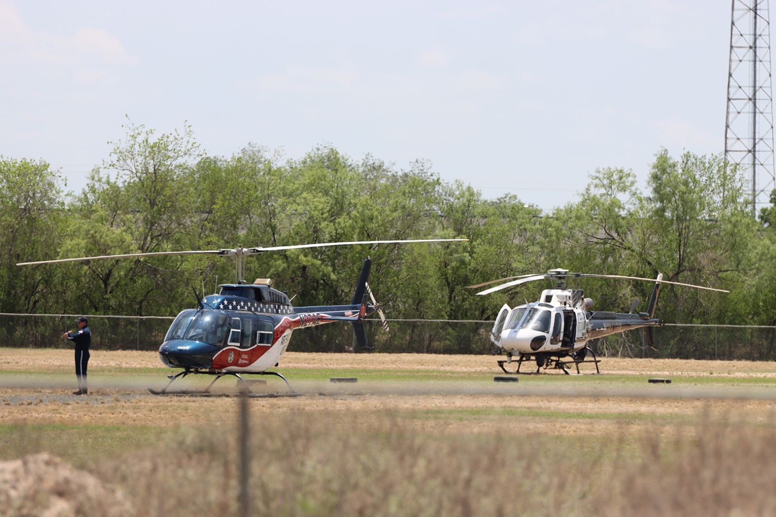 Helicopters are parked outside the school.