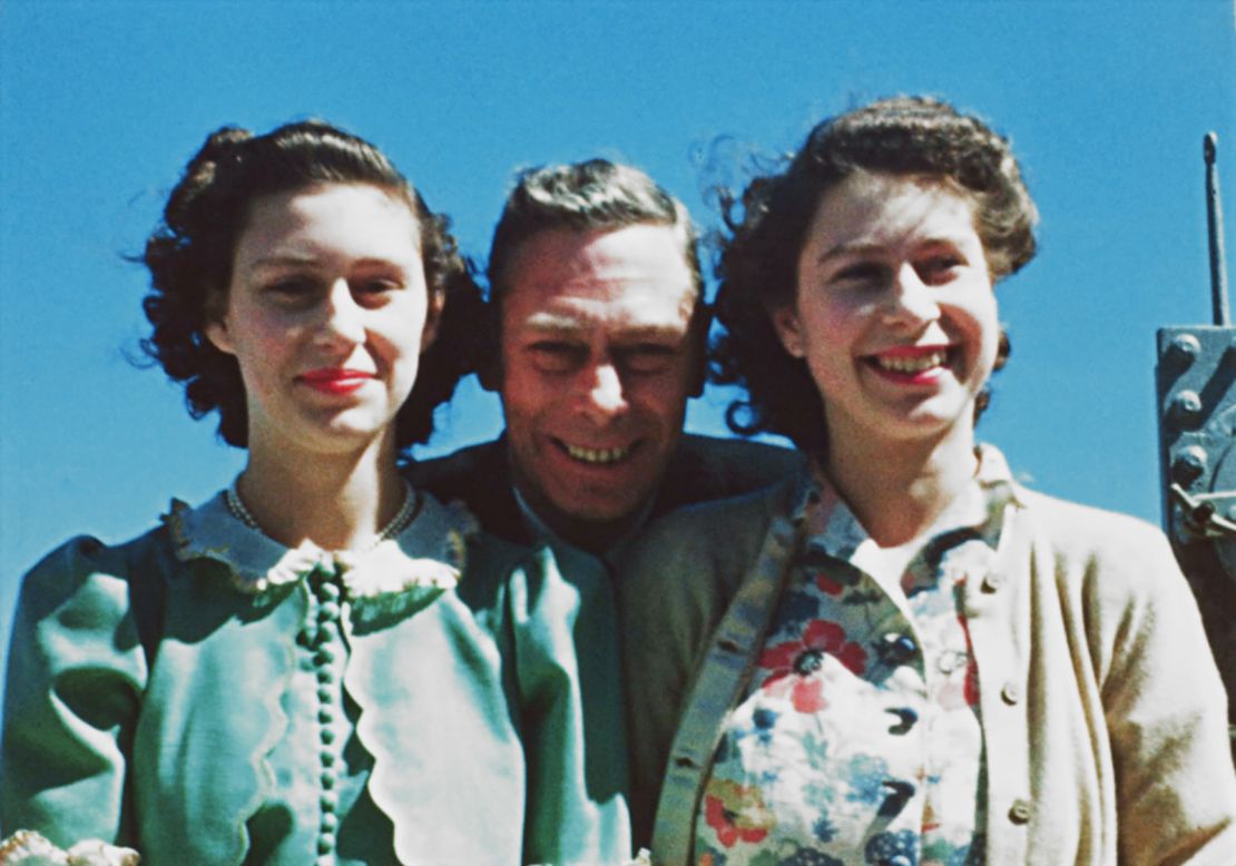 King George VI poses with his daughters, Princess Elizabeth and  Princess Margaret, in 1947.