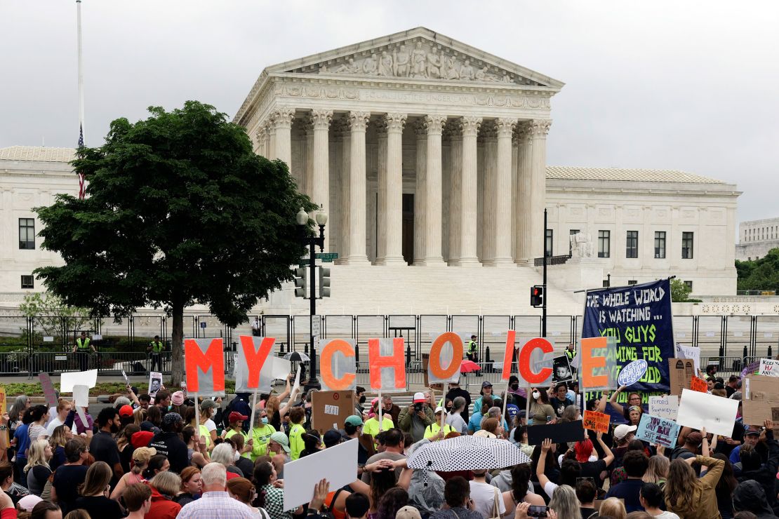 Abortion rights activists participate in a Bans Off Our Bodies rally on May 14, 2022 in Washington, DC.