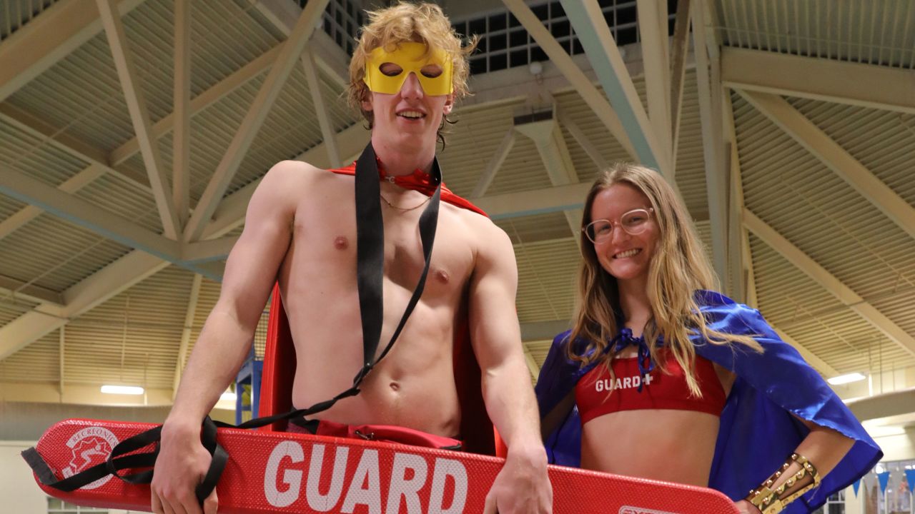 Lifeguards pose for Boulder's new marketing campaign for lifeguards, called 'Superheroes Wanted.'