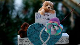 Xavier Lopez's cross stands at a memorial site for the victims killed in this week's shooting at Robb Elementary School in Uvalde, Texas, Friday, May 27, 2022. (AP Photo/Dario Lopez-Mills)