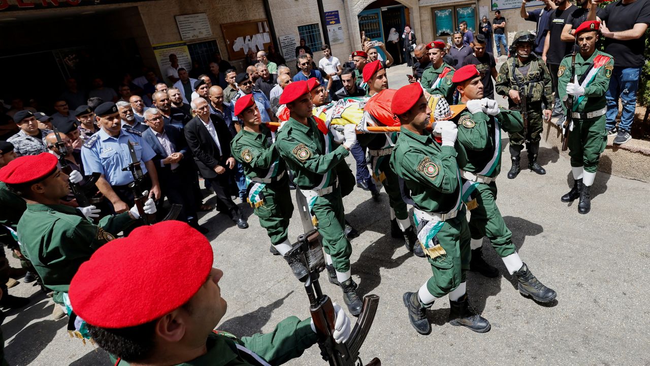 The body of Zaid Saeed Ghuneim is carried during his funeral at a hospital in Beit Jala in the West Bank on Saturday.