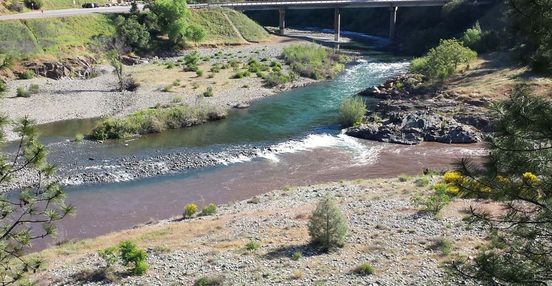 The confluence of the Middle and North Forks of the American River in Placer County. The Middle Fork, bottom, carried the ash and burned soil from the King Fire and merged with the clean North Fork.