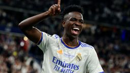 TOPSHOT - Real Madrid's Brazilian forward Vinicius Junior celebrates scoring the opening goal during the UEFA Champions League final football match between Liverpool and Real Madrid at the Stade de France in Saint-Denis, north of Paris, on May 28, 2022. (Photo by JAVIER SORIANO / AFP) (Photo by JAVIER SORIANO/AFP via Getty Images)