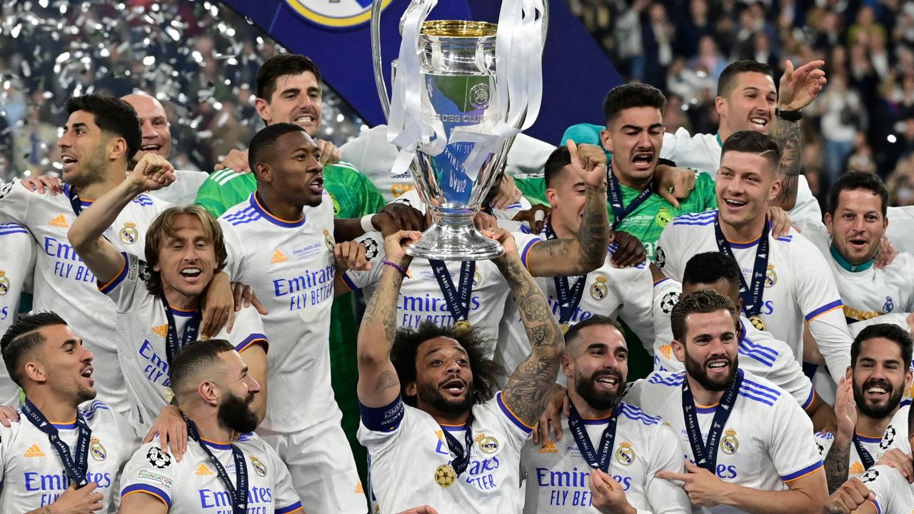 Real Madrid players celebrate after winning the Champions League final against Liverpool at the Stade de France in Paris, on May 28, 2022.