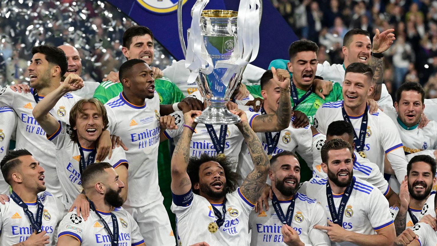 Real Madrid players celebrate after winning the Champions League final against Liverpool at the Stade de France in Paris, on May 28, 2022.
