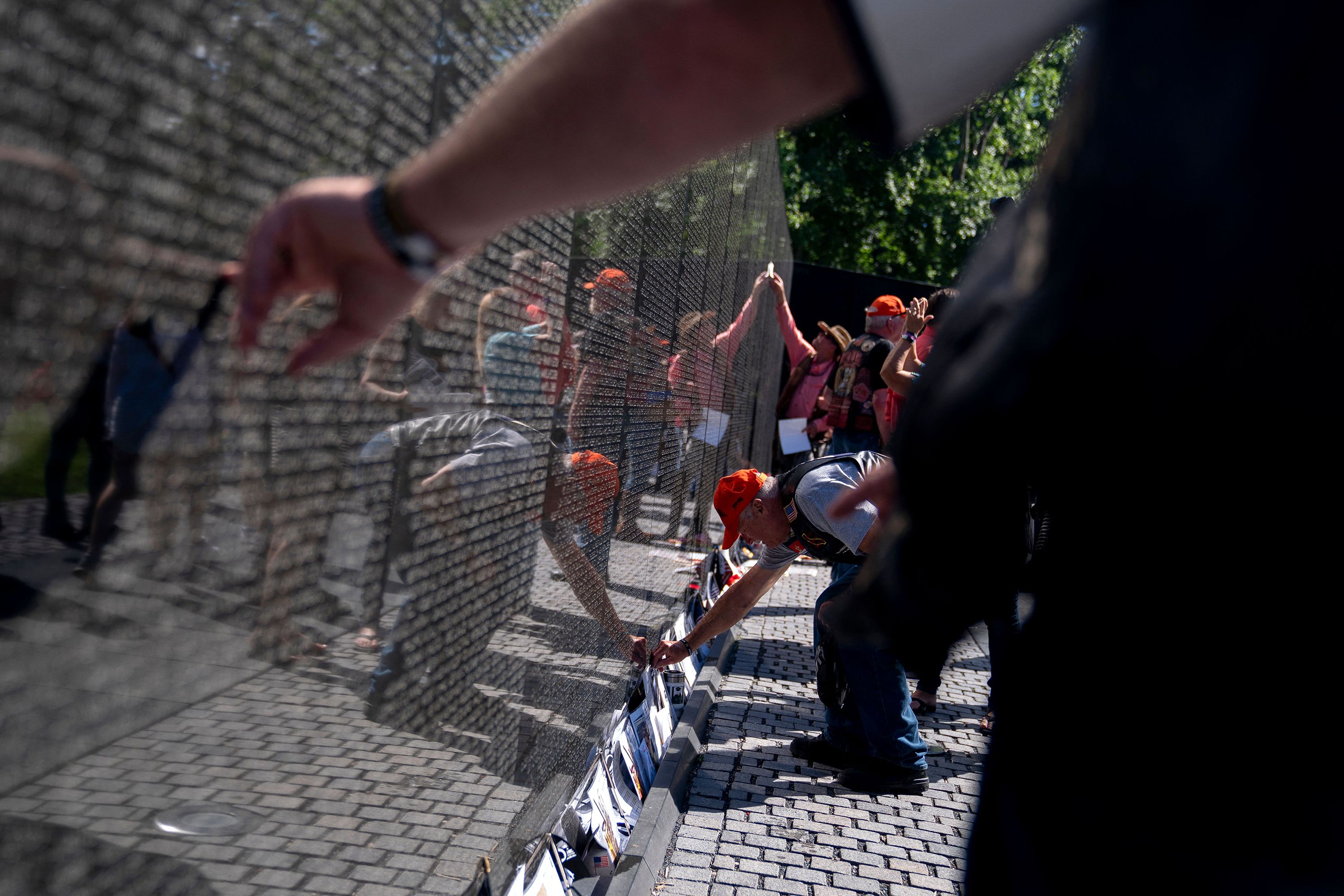 People look at the Vietnam Veterans Memorial in Washington, DC.