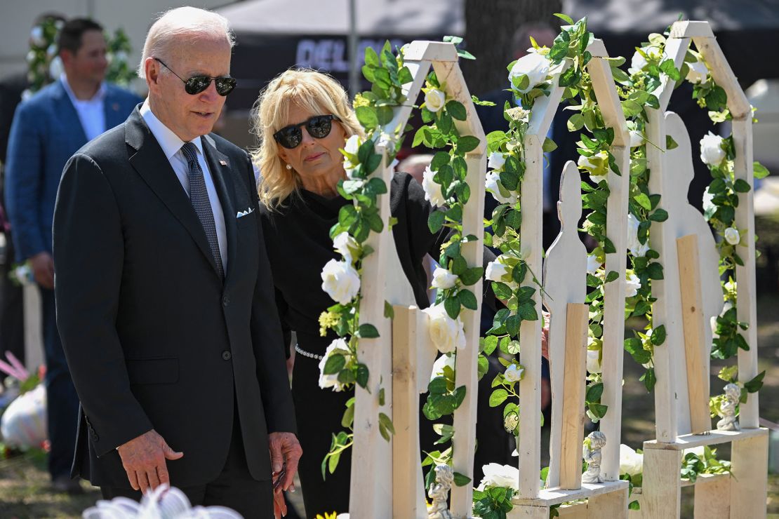 President Joe Biden and first lady Jill Biden pay their respects at a makeshift memorial outside of Robb Elementary School in Uvalde, Texas, on Sunday.