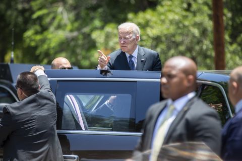 President Joe Biden looks back at the crowd gathered outside of the Sacred Heart Catholic Church after attending Mass in Uvalde on Sunday, May 29. People in the crowd shouted, 