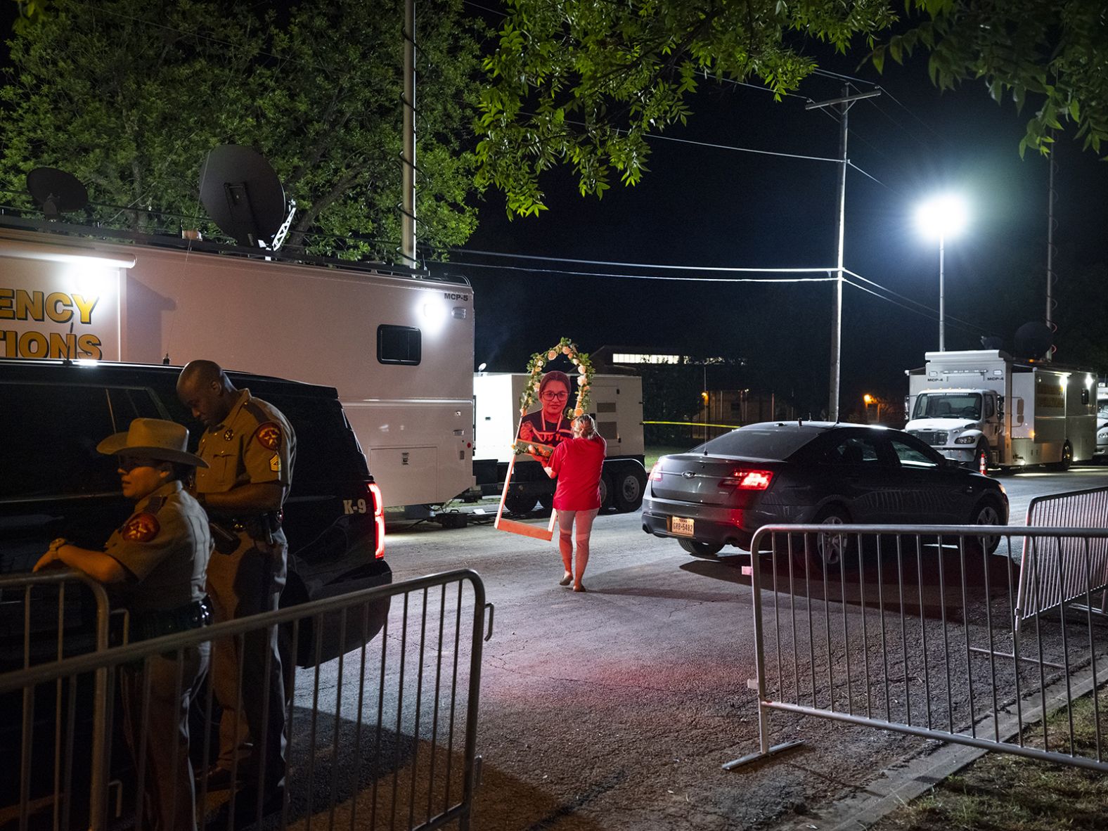 A cutout photograph of one of the victims is taken onto school grounds Saturday, May 28, in preparation for <a href="index.php?page=&url=https%3A%2F%2Fwww.cnn.com%2F2022%2F05%2F29%2Fpolitics%2Fjoe-biden-uvalde-texas-visit%2Findex.html" target="_blank">Biden's visit</a> the next day.
