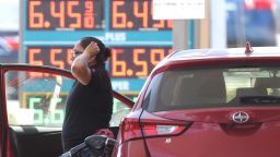 A customer pumps gas into their car at a gas station on May 18, 2022 in Petaluma, California. Gas prices in California have surpassed $6.00 per gallon for the first time ever. The average price per gallon of regular unleaded gasoline in California is at $6.05 and $6.29 in the San Francisco Bay Area. 