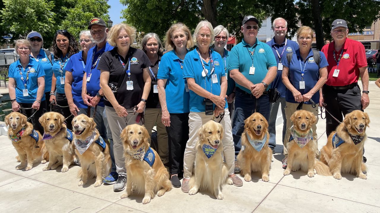 Dog handlers with Lutheran Church Charities offer comfort to grieving families in Uvalde, Texas.