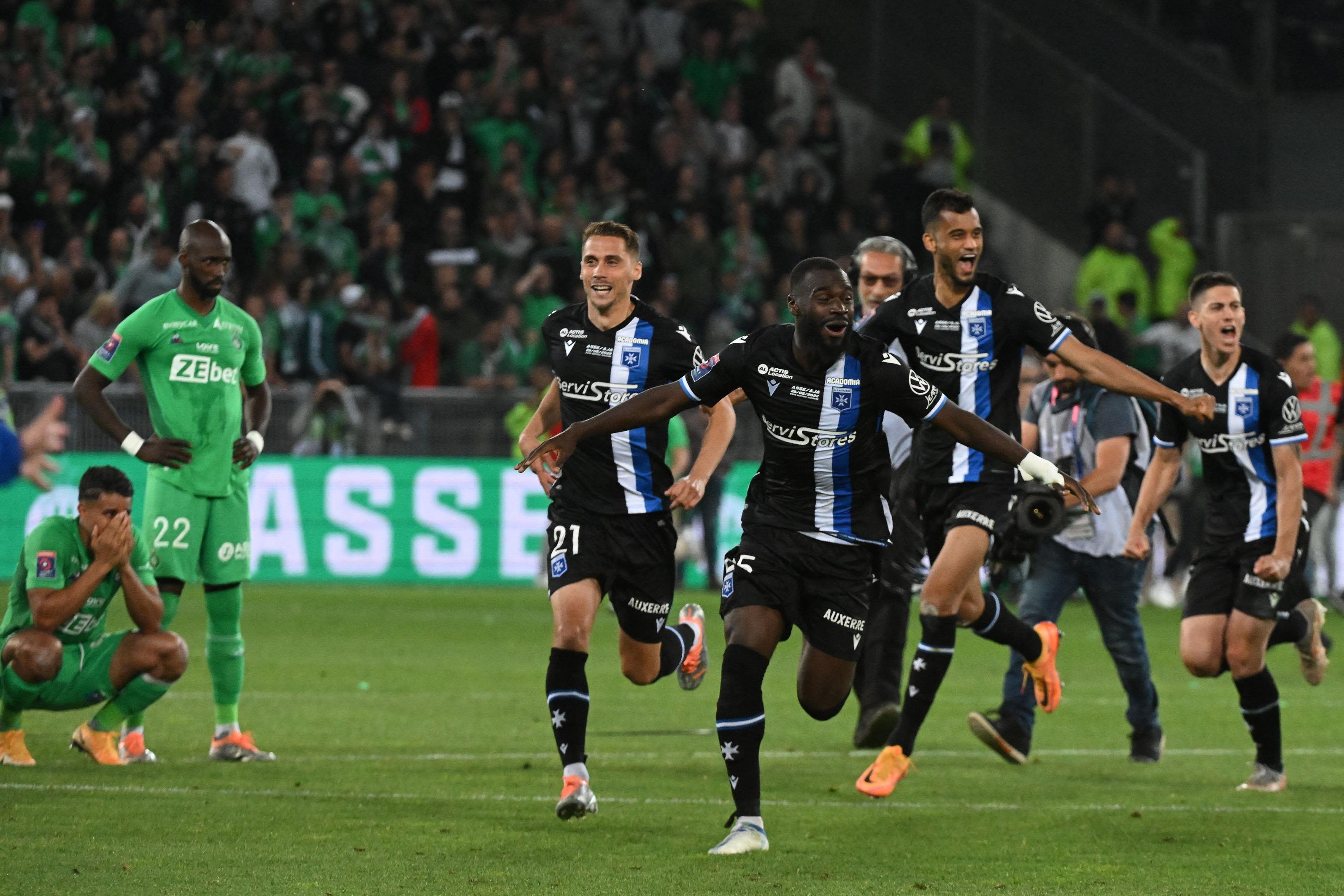 St Etienne: Chaos erupts as angry fans storm the pitch following club's  relegation to Ligue 2