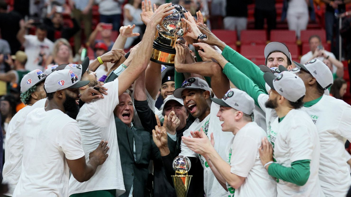 The Boston Celtics hoist the Eastern Conference Finals trophy after a Game 7 win in Miami.