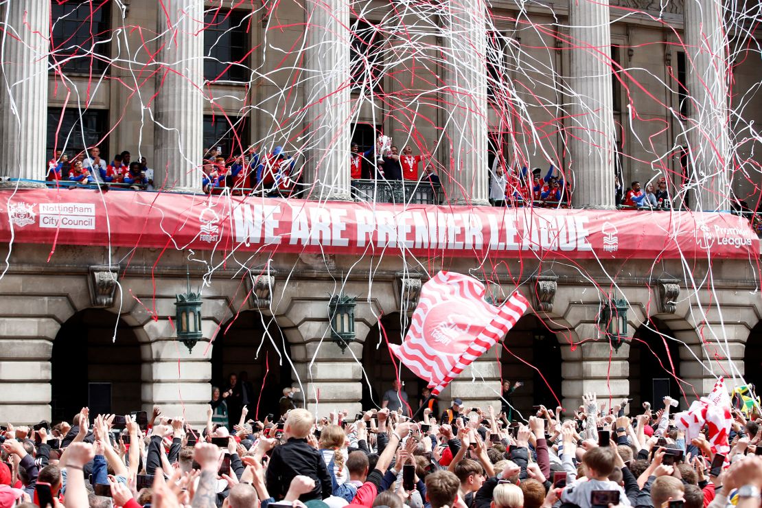 Nottingham Forest players Joe Worrall and Lewis Grabban celebrate during the club's victory parade.