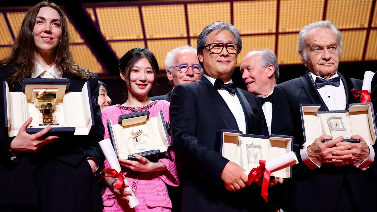 Gina Gammell, Jianying Chen, Park Chan-wook, Jerzy Skolimowski pose during the closing ceremony for the 75th Cannes Film Festival on May 28.
