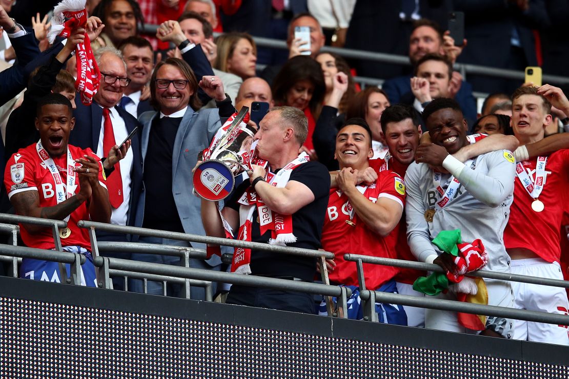 Before being appointed Forest manager, Steve Cooper (center) was a Liverpool youth coach and Swansea City manager. He also guided England's Under-17 team to victory in the Under-17 World Cup  in 2017.