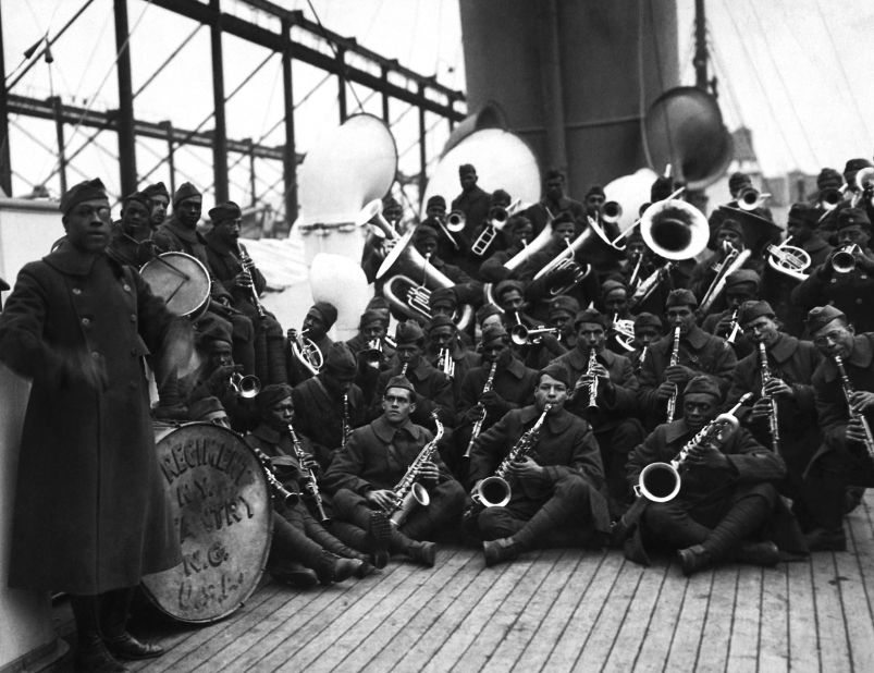 "Harlem Hellfighters" was a nickname of the 369th Infantry Regiment. Pictured in 1919, the regimental jazz band, with its famed bandleader Lieutenant James Reese Europe (left), <a href="index.php?page=&url=https%3A%2F%2Fwww.britannica.com%2Ftopic%2FHarlem-Hellfighters%2FDiscrimination-at-home-and-fame-abroad" target="_blank" target="_blank">played for vast crowds in Paris</a>. 