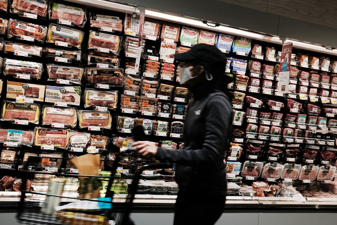 People shop at a grocery store on May 12, 2022, in New York City. 