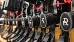In this March 9, 2017, photo a row of AR-15 style rifles manufactured by Daniel Defense sit in a vault at the company's headquarters in Black Creek, Ga. The company, based in Black Creek, Georgia, and founded in 2001, is one of the industry leaders in the making of long guns in the United States. President Donald Trump promised to revive manufacturing in the U.S., but one sector is poised to shrink under his watch: the gun industry. Fears of limits on guns led to a surge in demand during President Barack Obama's tenure and manufacturers leapt to keep up. (AP Photo/Lisa Marie Pane)