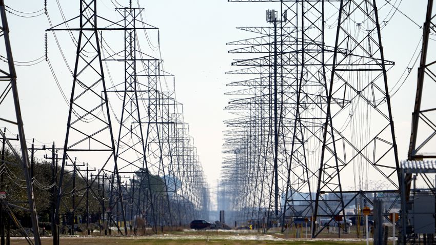 Power lines in Houston on February 16 2021. In a letter, Tuesday, July 6, 2021, one month after declaring the state's electric power grid fixed, Republican Gov. Greg Abbott is demanding aggressive action from state utility regulators to shore up that grid. (AP Photo/David J. Phillip, File)