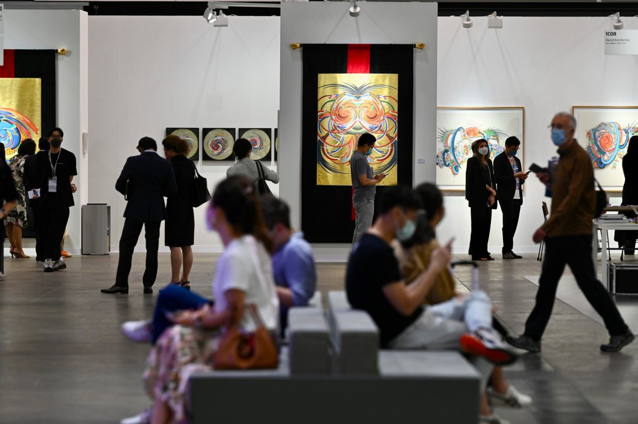 People visit Art Basel Hong Kong 2022 at the Hong Kong Convention and Exhibition Center on May 25, 2022. 