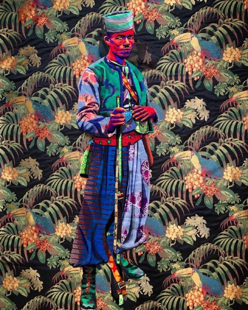 Butler says she likes working from black and white photos, because it's easier for her to trace out patterns based on the highlights and shadows, and they allow her to be more creative in her use of fabrics and color, like in this piece, inspired by photo of a West African Zouave soldier in Paris, in 1915. "The Zouaves were (one) of the most decorated units of the French army who came from north, west and East African French colonies," Butler wrote on Instagram. "The Zouaves were used on the front lines of WWI and suffered heavy casualties in France while still being under colonial oppression at home." 
