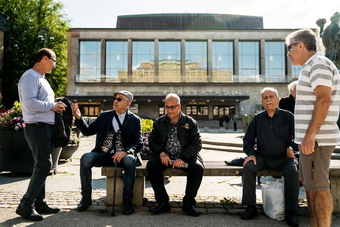 Fawzi Baban (far left) fled war in Iraq and has been in Sweden for 30 years.
