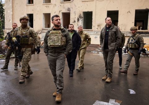 Ukrainian President Volodymyr Zelensky, third from left, visits front-line positions during a trip to the Kharkiv region on Sunday, May 29.