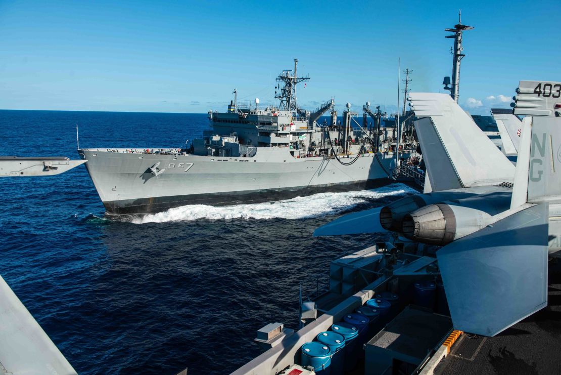 The fast combat support ship USNS Rainier steams alongside the aircraft carrier USS John C. Stennis during a replenishment-at-sea during the Rim of the Pacific maritime exercise in 2016.